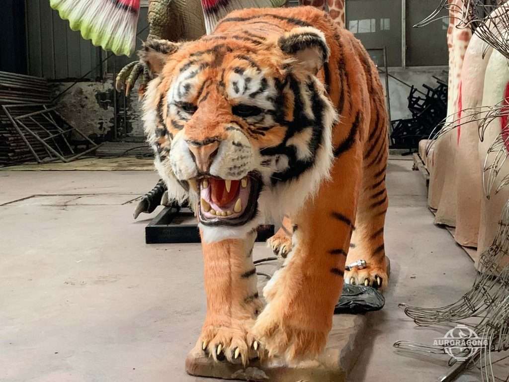 Animatronic life size tiger with open mouth and roaring pose