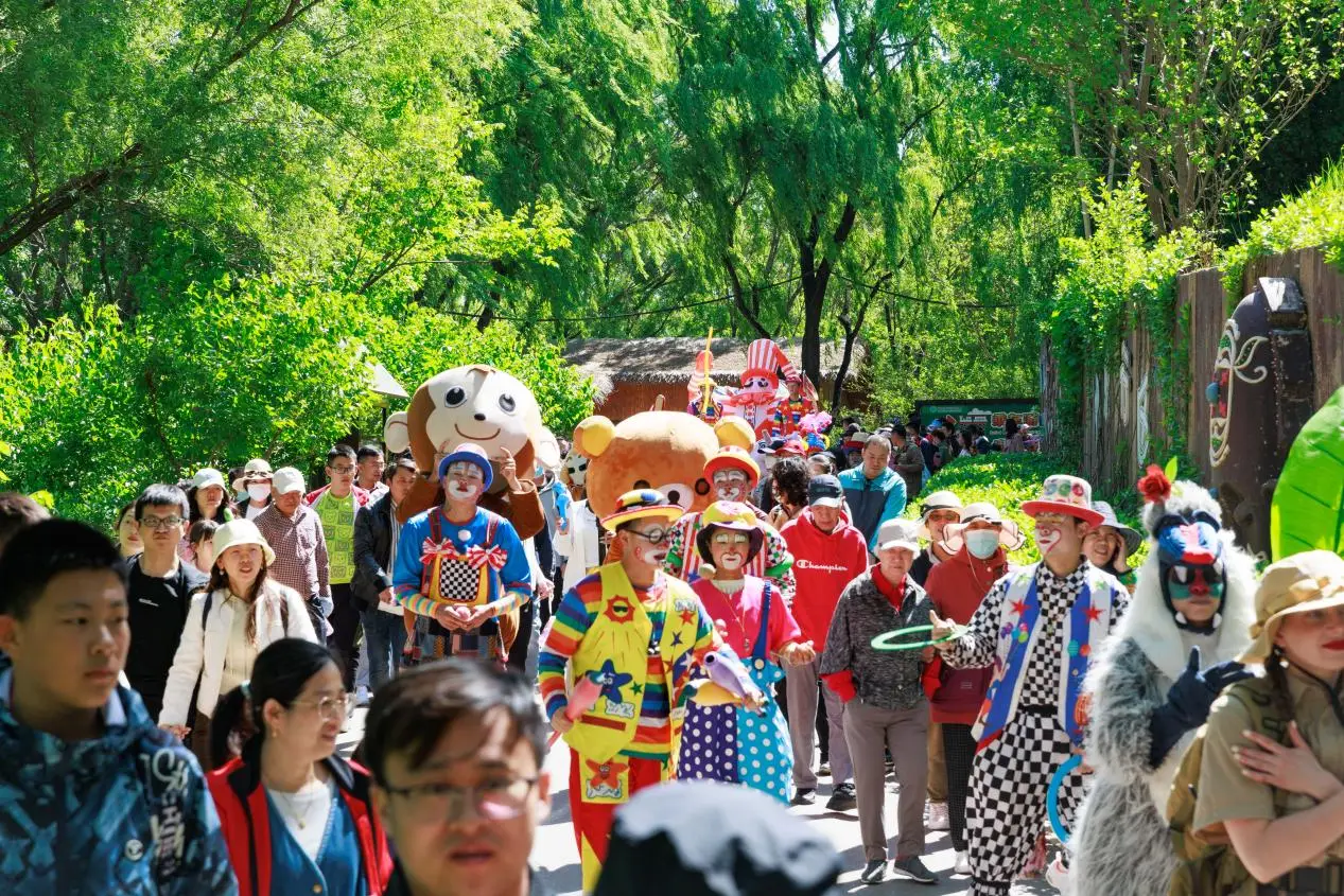 Carnival festival performer in lifelike orangutan costume