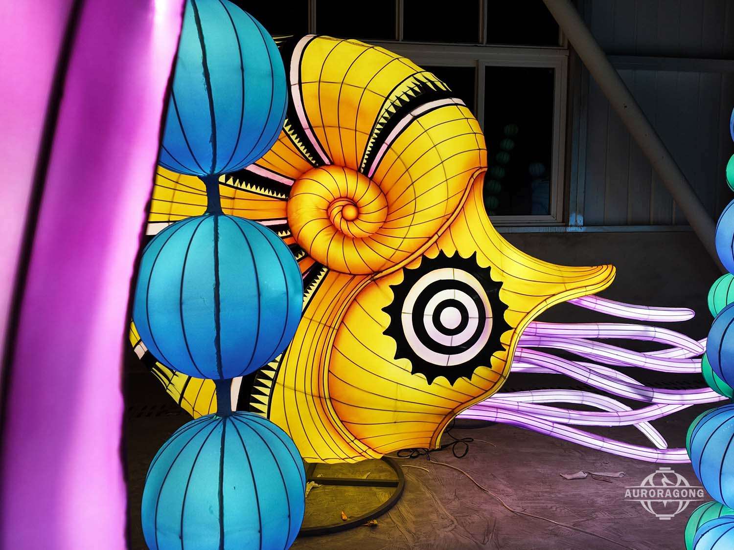 colorful ocean animal lanterns illuminated at night