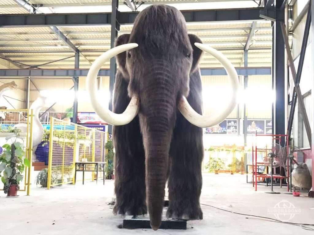 prehistoric mammoth animatronic with moving trunk and lifelike motion