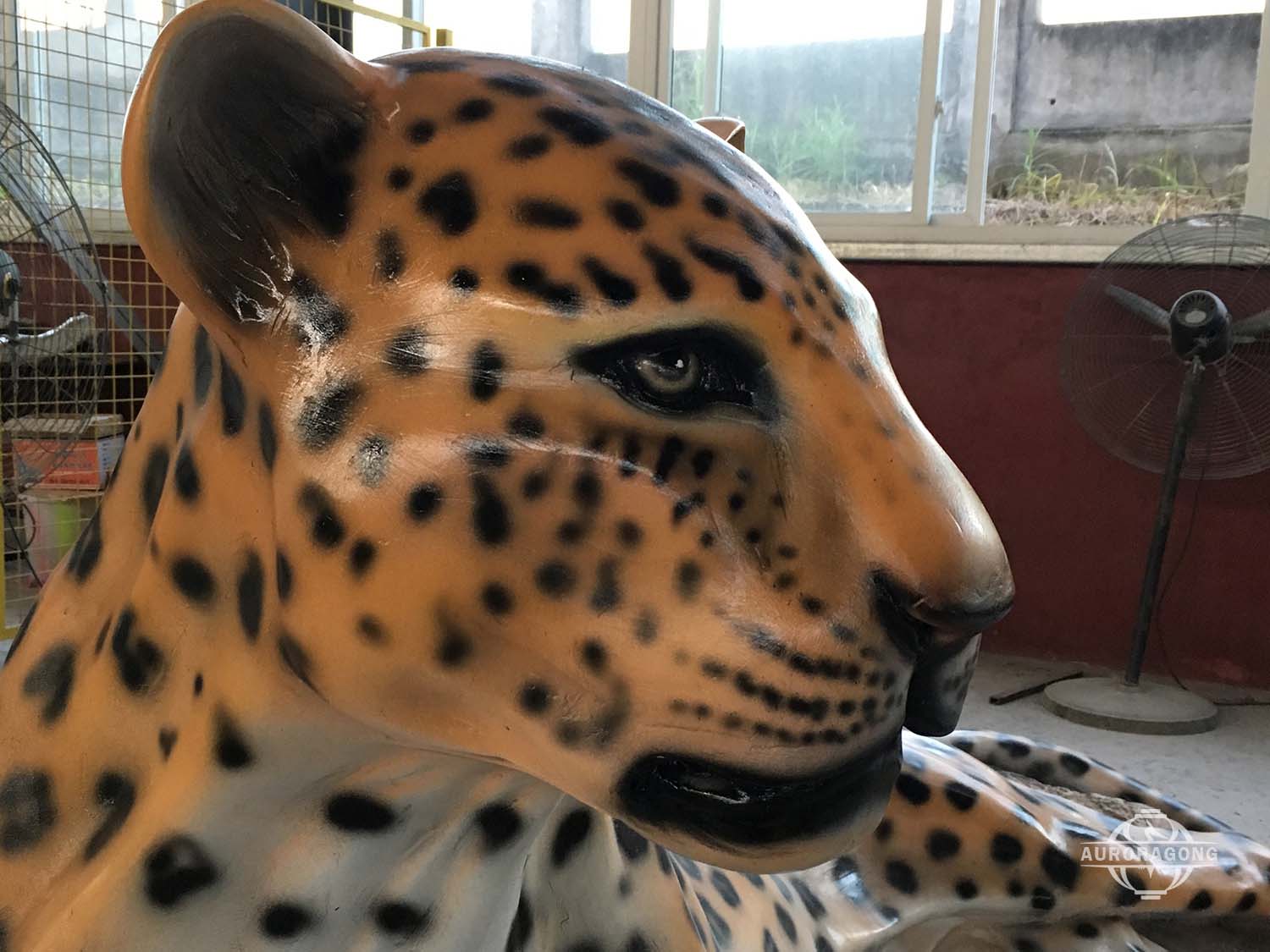 Realistic fiberglass leopard statue head details