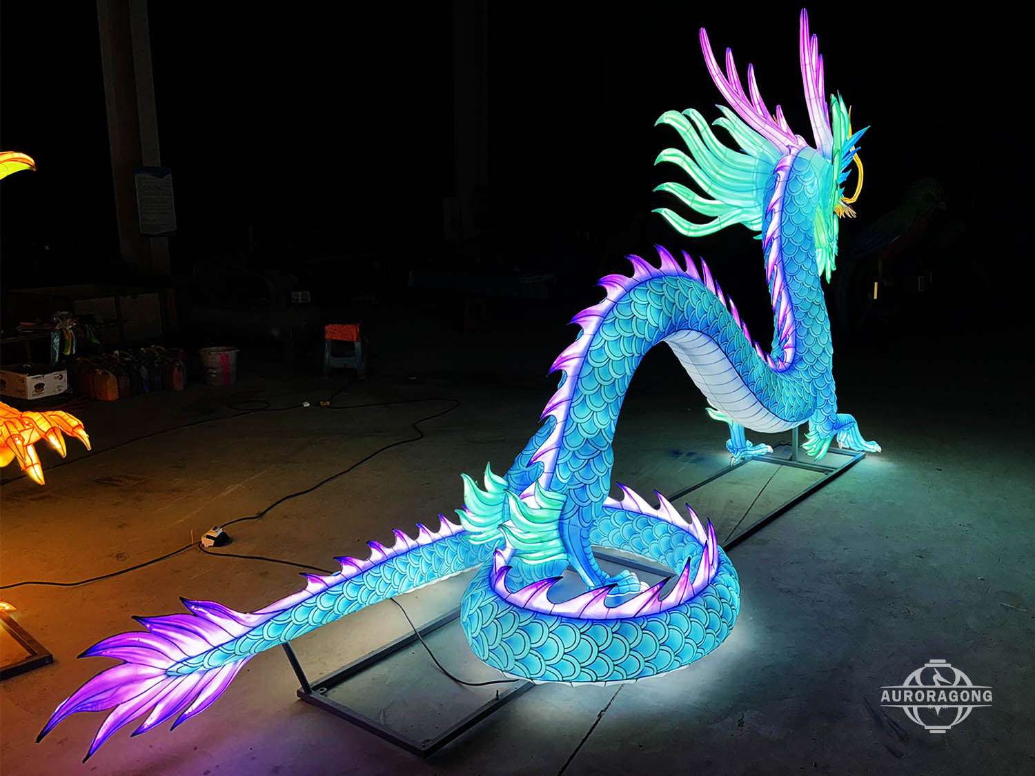 Blue Western dragon lantern illuminated at night