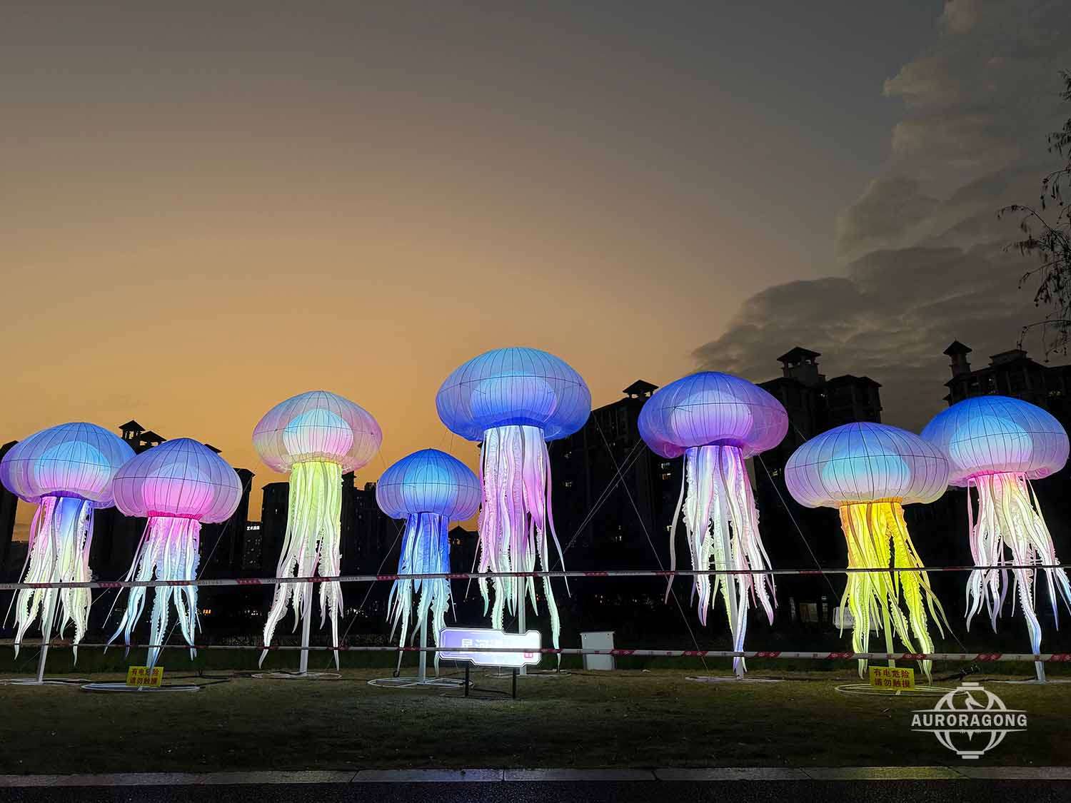 Giant jellyfish lantern installation with glowing underwater effect lighting
