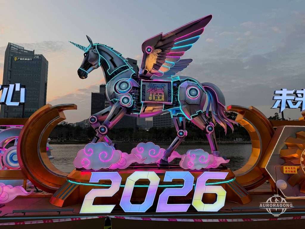 Custom cyberpunk mechanical pegasus lantern with multicolored neon wings at a 2026 festival display