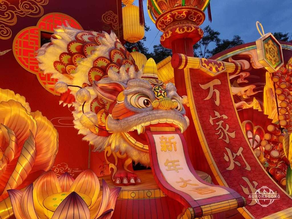 Detailed traditional Chinese lion dance head lantern with red auspicious banner for cultural festival displays
