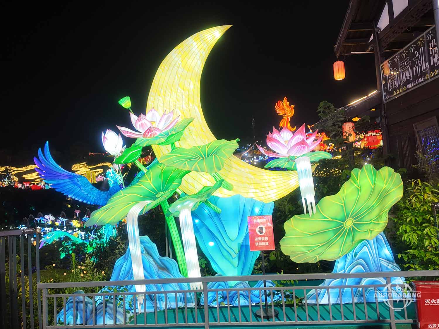 Custom botanical garden lantern installation with flowers and moon