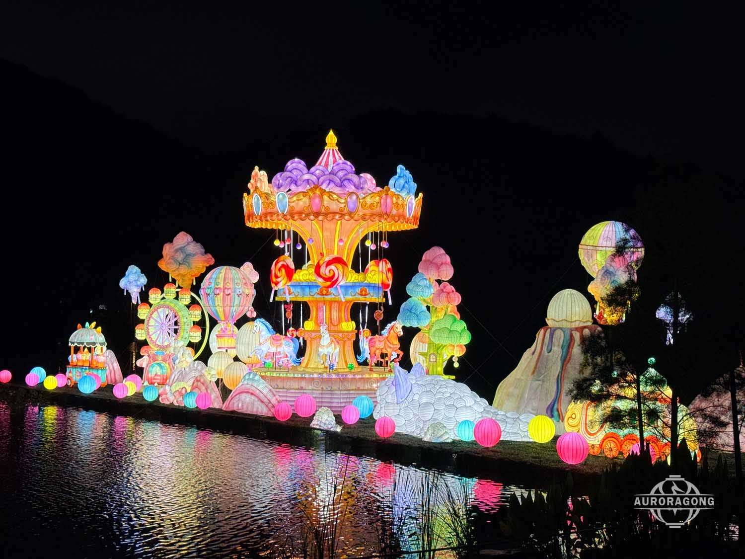 Nighttime outdoor carousel lantern display