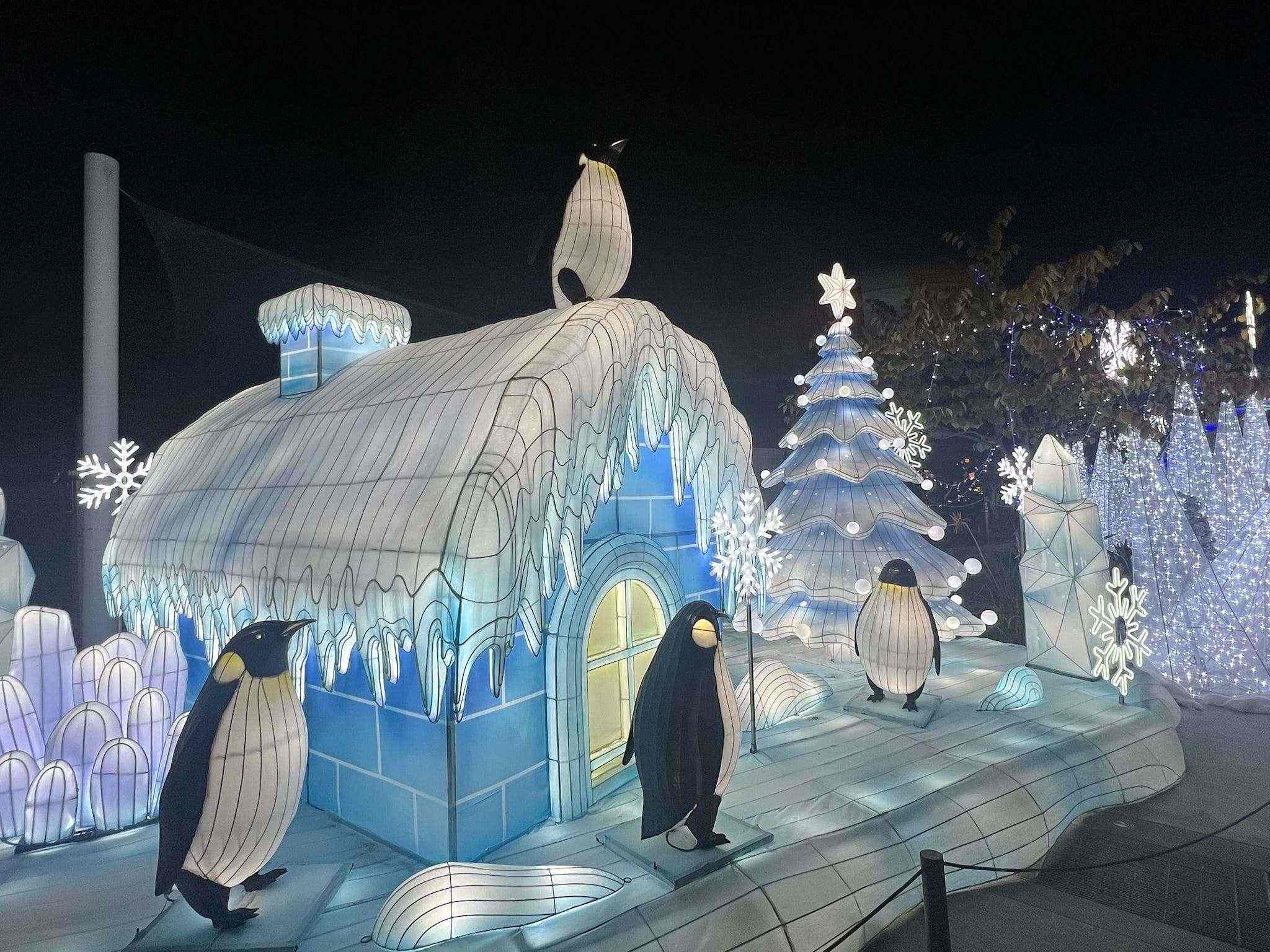 Arctic-themed light display with polar animals and ice structures