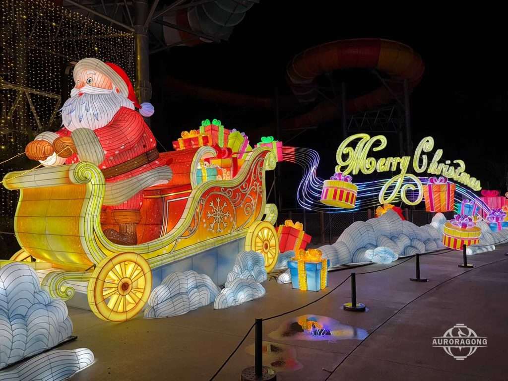 Christmas Santa sleigh and flying reindeer glowing lantern group for holiday festival display